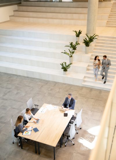 Aerial view young startup team working in the modern office